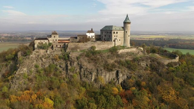 Scenic aerial view of impressive medieval Kuneticka Hora Castle on sunny autumn day, Pardubice Region, Czech Republic
