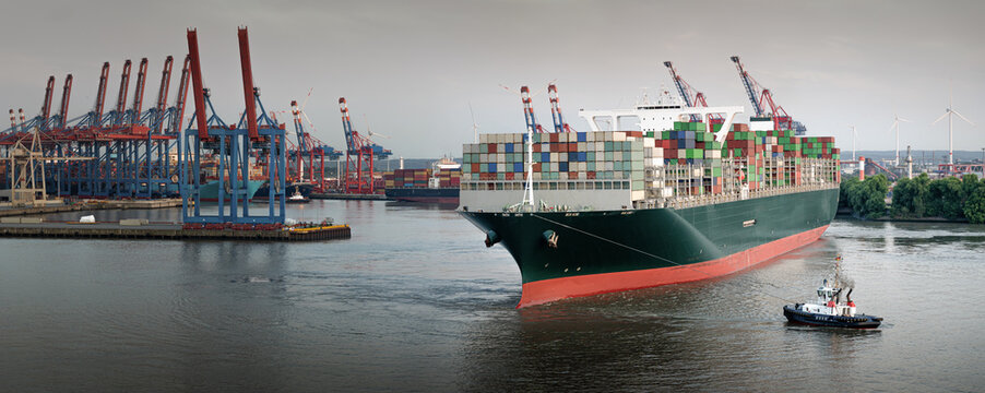 Panorama of a large container ship in the port of Hamburg 
