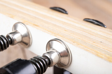 Carpentry clamp used for gluing wood. Small carpentry work in a home workshop.