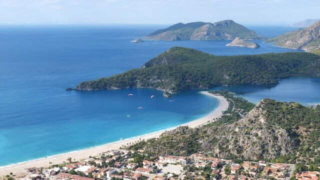 paragliding para gliding oludeniz fethiye turkey babadag blue lagoon scenery on the sea of mediterranean