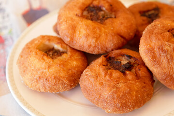 Close-up of Tatar deep-fried patties belyashi with meat and onions. 