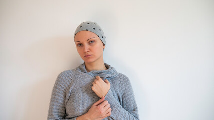 Sad, frightened, exhausted  and depressed female cancer patient portrait with copy space.