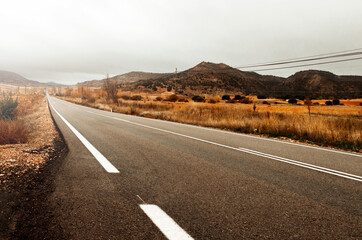 endless road in a cloudy environment