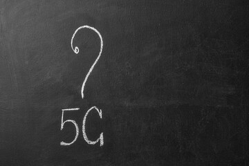 5g inscription and question mark on a chalk board