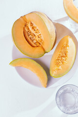 Muskmelon fruit on white background