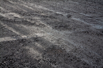 Traces on the road from the tires of racing dredges