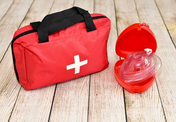 Naklejka premium First aid supplies and emergency kit for disaster relief and helping during trauma incidents and first responders