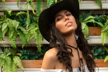 Beautiful smiling young south girl boho style clothing and jewelry