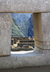 old stone wall with window in Machu Picchu
