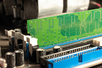 RAM in the motherboard slot closeup. Computer components. Hardware