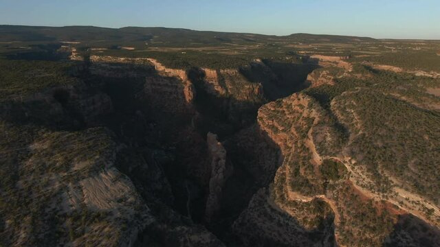 early morning drone flight over red rock formations bang canyon near grand junction colorado