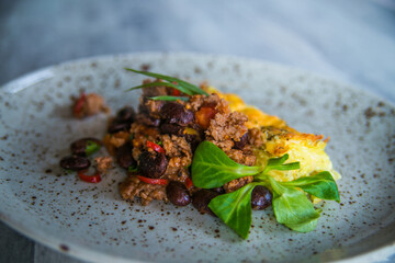 potato casserole with meat served on a plate