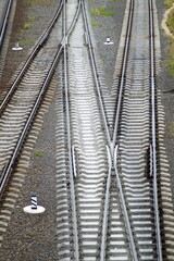 Rails. Railway track close-up. Curved Switches Sleepers Perspective Infrastructure