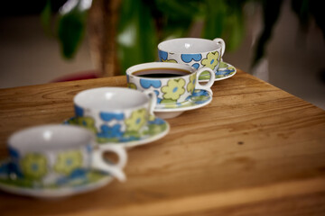 Preparation of a delicious Colombian café traditionally filtered with fabric. On the table...