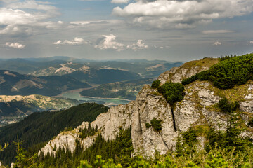 Beautiful view from Ceahlau mountain over the Izvorul Muntelui lake valley (Romania)