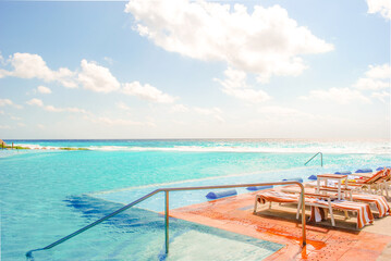 big infinity pool with salt water in the Caribbean sea in bright sunny afternoon. Summer tropical...
