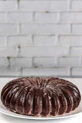 Chocolate bundt cake with strawberry frosting