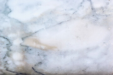 Obraz na płótnie Canvas The marble surface shows natural patterns.