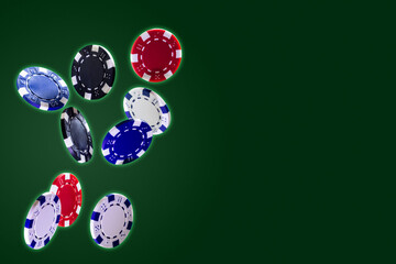 Poker playing chips flying in the air on a green background. Levitation. Copy space.