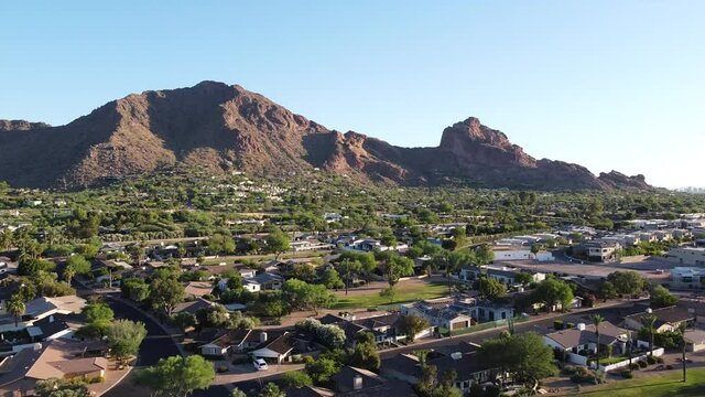 Traveling from Phoenix to Scottsdale, passing through Camelback Mountain and neighborhood.