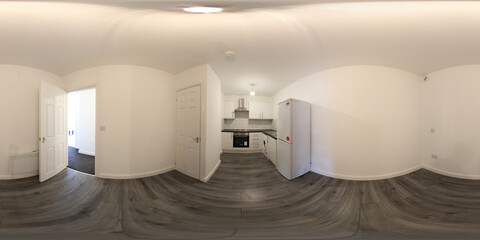 360 Degree spherical panorama sphere photo of a brand new typical British kitchen in an apartment...