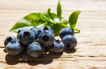 Close up of Blueberry Fruit (Vaccinium Corymbosum) on wooden board, also known as Northern Highbush Blueberry