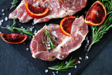 Raw meat steaks with spices. Grilled meat.