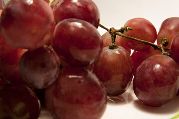 tasty ripe juicy grapes isolated on white closeup