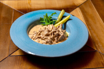 Stew with mashed potatoes, a lunch dish in a cafe or at home

