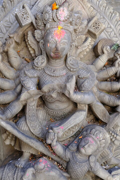 Bhaktapur Nepal - artful wood carving of Ugrachandi image and sacrifices to Shiva