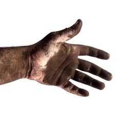 the hand of a male chimney sweep in black soot close up isolated on a white background