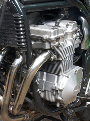 Fototapeta na wymiar The inline 4 cylinder motorcycle engine is a popular engine for sports bikes.