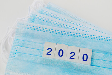Bunch of blue medical masks with number 2020