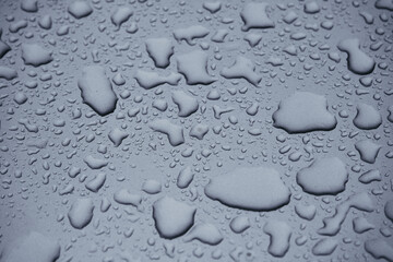 Background of the waterdrops on a silver surface