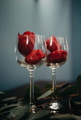 Roses in two Wine Glasses