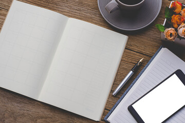 Mock up image of black mobile smart phone with blank white screen, weekly planner notebook, pen,...