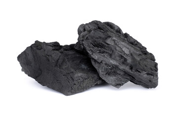 Heap of natural broken black wood charcoal granular  isolated on white background.  - obrazy, fototapety, plakaty