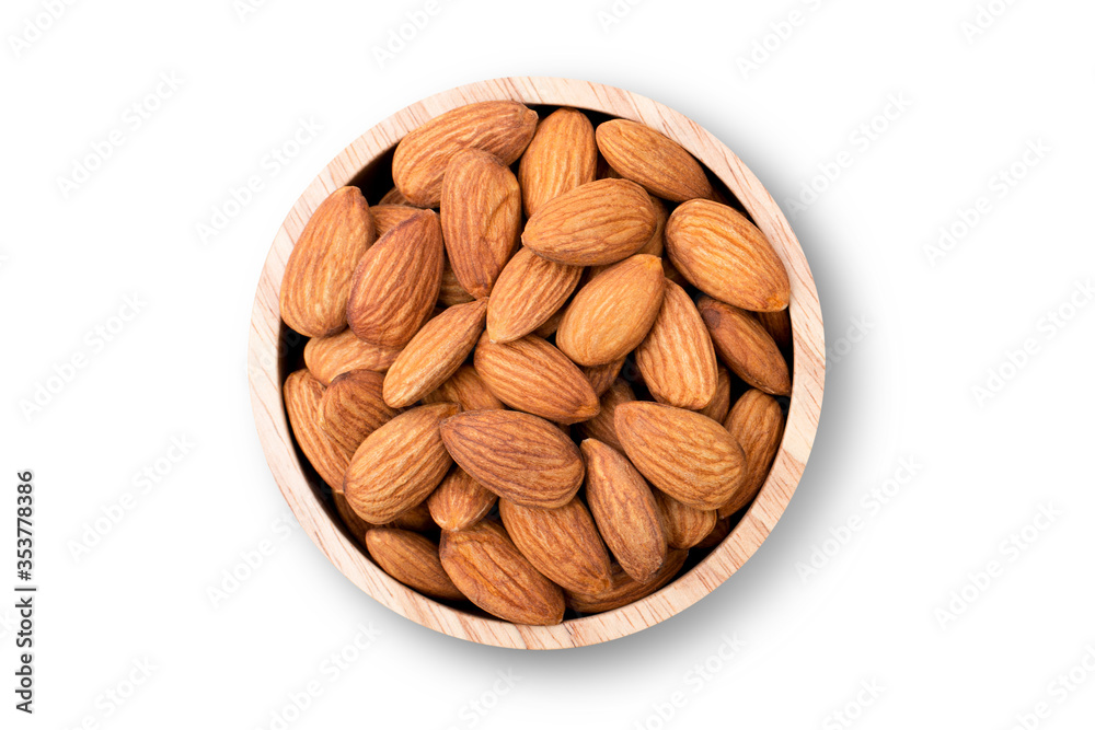 Wall mural Closeup almond nuts in wooden bowl isolated on white background with clipping path. Overhead view. Flat lay. - Wall murals