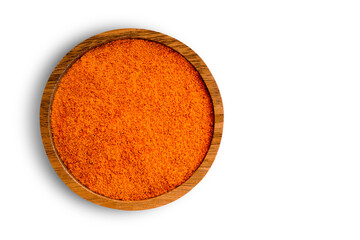 Closeup turmeric ( known as curcumin, Curcuma longa Linn) powder in wooden bowl isolated on white background with clipping path.Top view. Flat lay.