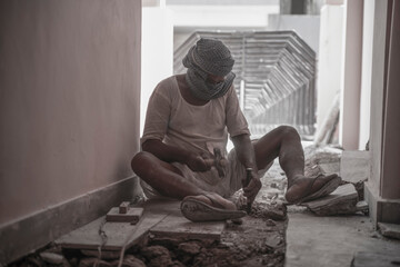 Naklejka na ściany i meble jaipur. Rajasthan. India - may 21, 2020 Asia people work hard about construction in factory with wearing mask (covid19 )