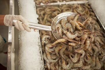   woman puts food in the store  