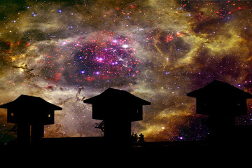 nebula and galaxy backand silhouette dam in the night sky