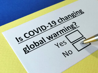 Fototapeta premium One person is answering question about covid-19 effects on global warming.