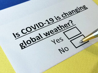 Obraz premium One person is answering question about covid-19 effects on global warming.