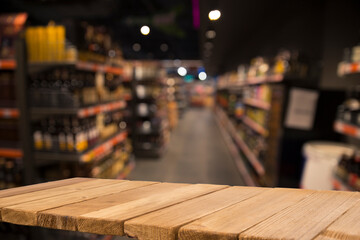 Wood top table on blur supermarket background