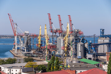 Fototapeta na wymiar Harbor cranes in the Cargo Port of Odessa, Ukraine