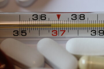 thermometer and tablets