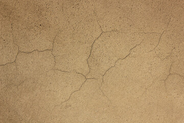 cement wall with cracks as a background