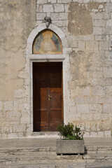 Fototapeta na wymiar Particolare porta della cattedrale di Alatri