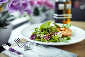 grilled chicken breast and salad